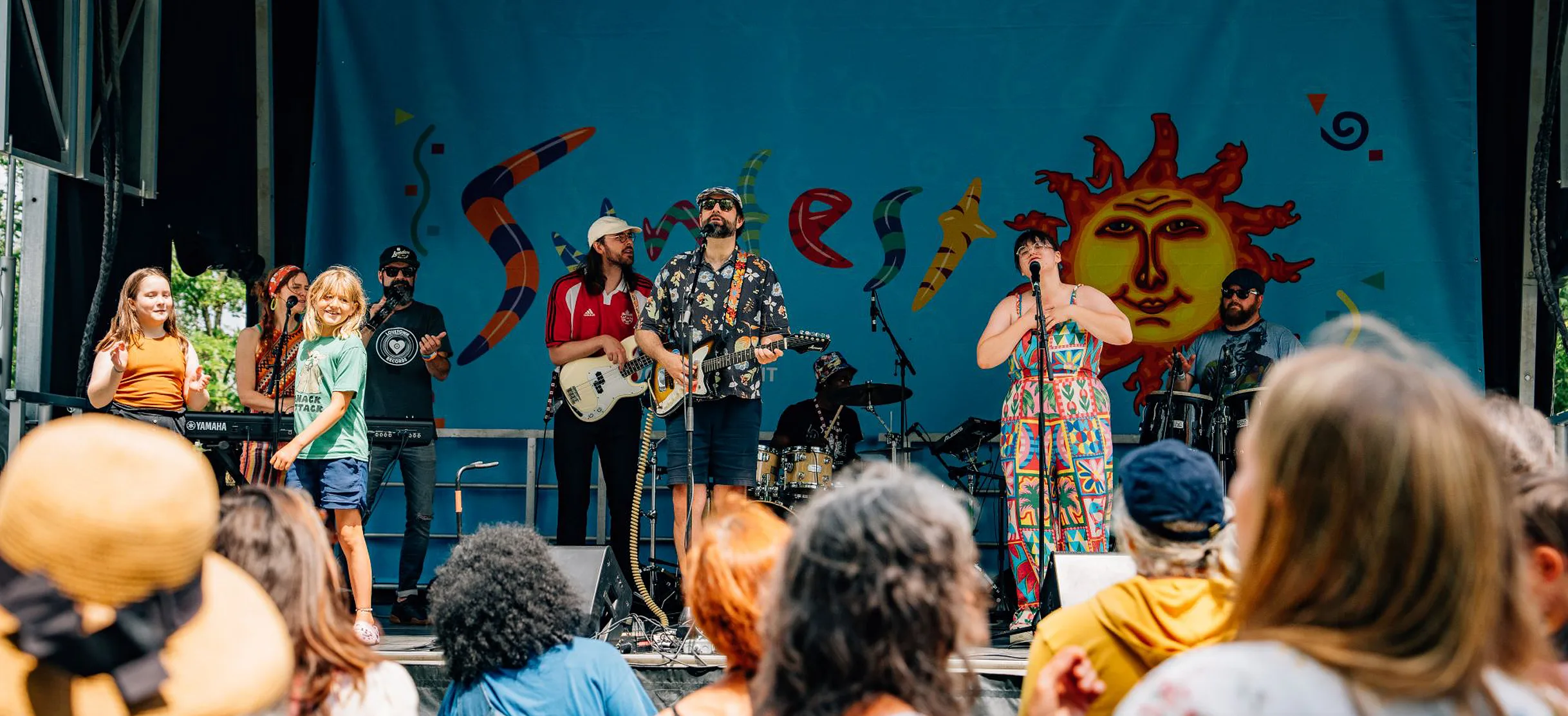 artist singing on stage